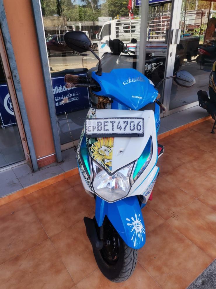 Blue and 2025 white dio scooty